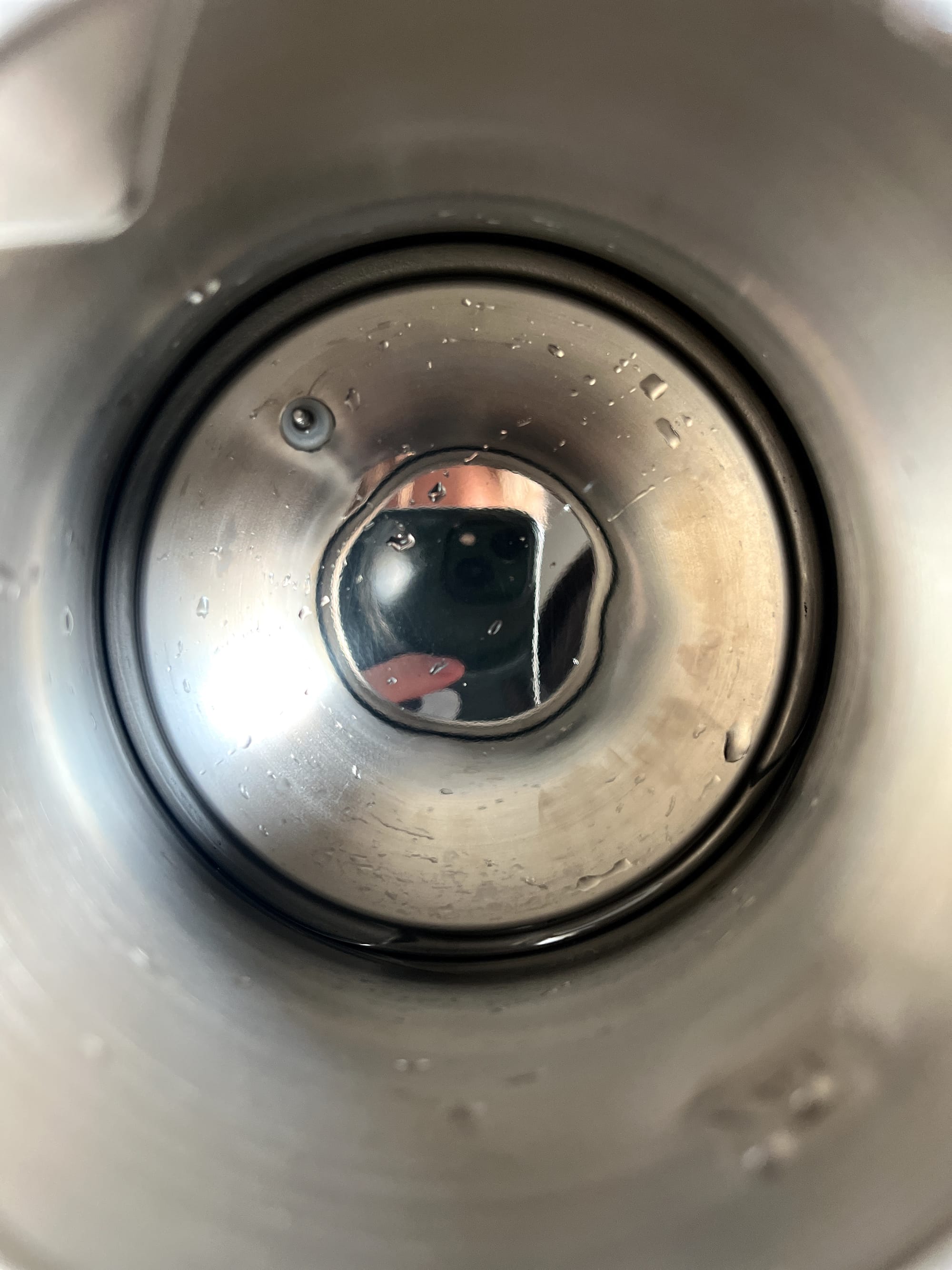 A clean kettle with just a twinge of brownish discoloration on the floor.